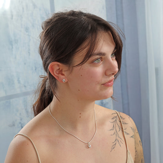 Bergkristall Anhänger facettiert | Ovale Perle 8x6 mm | 925er Silber gefasst