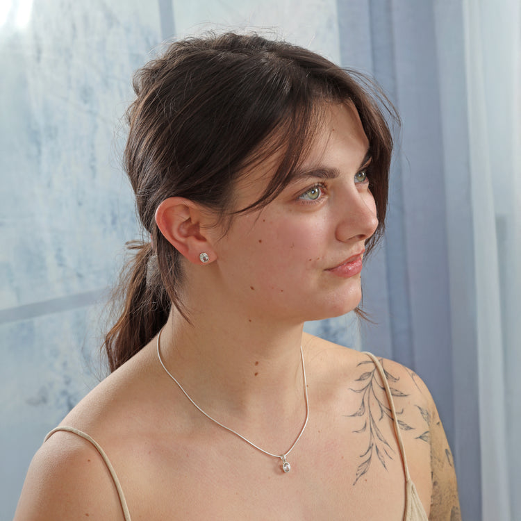 Bergkristall Anhänger facettiert | Ovale Perle 8x6 mm | 925er Silber gefasst